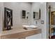 Bathroom featuring a modern vessel sink and light walls at 5777 N 78Th Pl, Scottsdale, AZ 85250