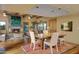 Open dining room with hardwood floors and fireplace at 5777 N 78Th Pl, Scottsdale, AZ 85250