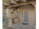 Inviting front entry with a decorative door and large pot at 5777 N 78Th Pl, Scottsdale, AZ 85250