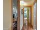 Bright hallway with hardwood floors and access to bedrooms at 5777 N 78Th Pl, Scottsdale, AZ 85250