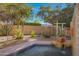 Landscaped backyard with a small pool and water feature at 5777 N 78Th Pl, Scottsdale, AZ 85250