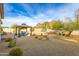 Landscaped backyard with gazebo, perfect for outdoor entertaining at 605 N Star Ct, Apache Junction, AZ 85119