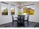 Bright dining area with mountain views and a charming table set at 605 N Star Ct, Apache Junction, AZ 85119