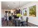 Kitchen and dining area with mountain views at 605 N Star Ct, Apache Junction, AZ 85119