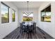 Bright dining area with mountain views and a charming table set at 605 N Star Ct, Apache Junction, AZ 85119