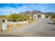 Luxury desert home with 3-car garage and paved driveway at 605 N Star Ct, Apache Junction, AZ 85119