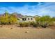 Desert home with mountain views and landscaped yard at 605 N Star Ct, Apache Junction, AZ 85119