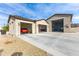 Spacious three-car garage with ample storage space at 605 N Star Ct, Apache Junction, AZ 85119