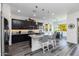 Modern kitchen with dark cabinets, granite counters, and island at 605 N Star Ct, Apache Junction, AZ 85119