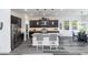 Modern kitchen with island, dark cabinets, and granite counters at 605 N Star Ct, Apache Junction, AZ 85119