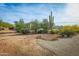 Landscaped yard with desert plants and gravel at 605 N Star Ct, Apache Junction, AZ 85119