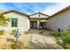 Small patio with seating area and fountain at 605 N Star Ct, Apache Junction, AZ 85119