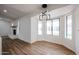 Bright dining area with hardwood floors and large windows at 619 N Norfolk --, Mesa, AZ 85205