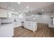 Modern white kitchen with quartz countertops and stainless steel appliances at 619 N Norfolk --, Mesa, AZ 85205