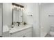 Modern bathroom with white vanity and quartz countertop at 623 W Guadalupe Rd # 223, Mesa, AZ 85210