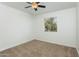 Bedroom with carpeted floor and ceiling fan at 623 W Guadalupe Rd # 223, Mesa, AZ 85210