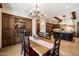 Charming breakfast nook with a wooden table and built-in shelving at 6601 E Valley Vista Ln, Paradise Valley, AZ 85253