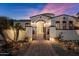 Welcoming entryway with gated access and beautifully landscaped walkway at 6601 E Valley Vista Ln, Paradise Valley, AZ 85253