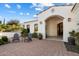 Front entrance with brick pavers and seating area at 6601 E Valley Vista Ln, Paradise Valley, AZ 85253