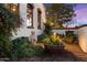 Landscaped garden with statue and large planter, adding curb appeal at 6601 E Valley Vista Ln, Paradise Valley, AZ 85253