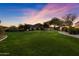 Large grassy area with mountain views, offering a peaceful setting at 6601 E Valley Vista Ln, Paradise Valley, AZ 85253