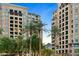 Luxury apartment building with palm trees and mountain views at 7175 E Camelback Rd # 601, Scottsdale, AZ 85251