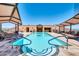 Rooftop pool and spa with city views, lounge chairs, and shaded areas at 7175 E Camelback Rd # 601, Scottsdale, AZ 85251