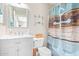 Clean bathroom with marble vanity and a stylish shower curtain at 7244 S Sunrise Way, Buckeye, AZ 85326