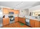 Modern kitchen with stainless steel appliances and ample counter space at 7244 S Sunrise Way, Buckeye, AZ 85326