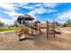 Modern playground with slides, climbing structures, and play equipment at 7244 S Sunrise Way, Buckeye, AZ 85326