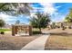 playground with covered seating area and play structures at 7244 S Sunrise Way, Buckeye, AZ 85326