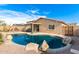 Inviting backyard pool with patio and seating area at 7244 S Sunrise Way, Buckeye, AZ 85326