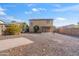 House exterior and large gravel backyard at 7504 S Sundown Ct, Buckeye, AZ 85326