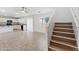 Bright kitchen with white cabinets, tile floors, and stainless steel appliances at 7504 S Sundown Ct, Buckeye, AZ 85326