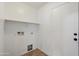 Laundry room with shelving and tile flooring at 7504 S Sundown Ct, Buckeye, AZ 85326