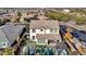 Aerial view of house, pool, and surrounding area at 7563 E Plata Ave, Mesa, AZ 85212