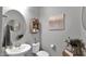 Stylish powder room with modern vanity and decorative accents at 7563 E Plata Ave, Mesa, AZ 85212