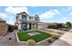 Two-story house with a landscaped yard and a neutral color scheme at 7563 E Plata Ave, Mesa, AZ 85212