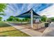 Community playground with shade structure for children at 7563 E Plata Ave, Mesa, AZ 85212