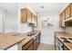 Clean and functional kitchen featuring wood cabinets and ample counter space at 8131 N 107Th Ave # 76, Peoria, AZ 85345