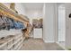 Organized closet with hanging rods and shoe storage at 8448 W Candlewood Way, Florence, AZ 85132