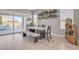 Bright dining area with sliding door access to the backyard at 8448 W Candlewood Way, Florence, AZ 85132