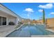 Stunning pool with a spacious patio, providing ample space for entertaining at 8448 W Candlewood Way, Florence, AZ 85132