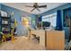 Bedroom with desk, shelving, and giraffe decor at 9022 W Ross Ave, Peoria, AZ 85382