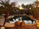 Serene pool and patio area at sunset at 9022 W Ross Ave, Peoria, AZ 85382