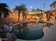 Inviting pool with surrounding patio and string lights at 9022 W Ross Ave, Peoria, AZ 85382