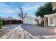 Detached garage with additional patio space at 903 W Mackenzie Dr, Phoenix, AZ 85013