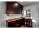 Corner desk with wood countertop in updated kitchen at 903 W Mackenzie Dr, Phoenix, AZ 85013