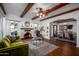 Spacious living room featuring hardwood floors and a fireplace at 903 W Mackenzie Dr, Phoenix, AZ 85013