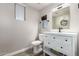 Clean bathroom with white vanity and modern fixtures at 9823 E Escondido Ave, Mesa, AZ 85208